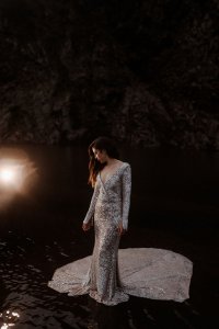 A silver long sleeved sequin Custom Bridal Wedding Dress